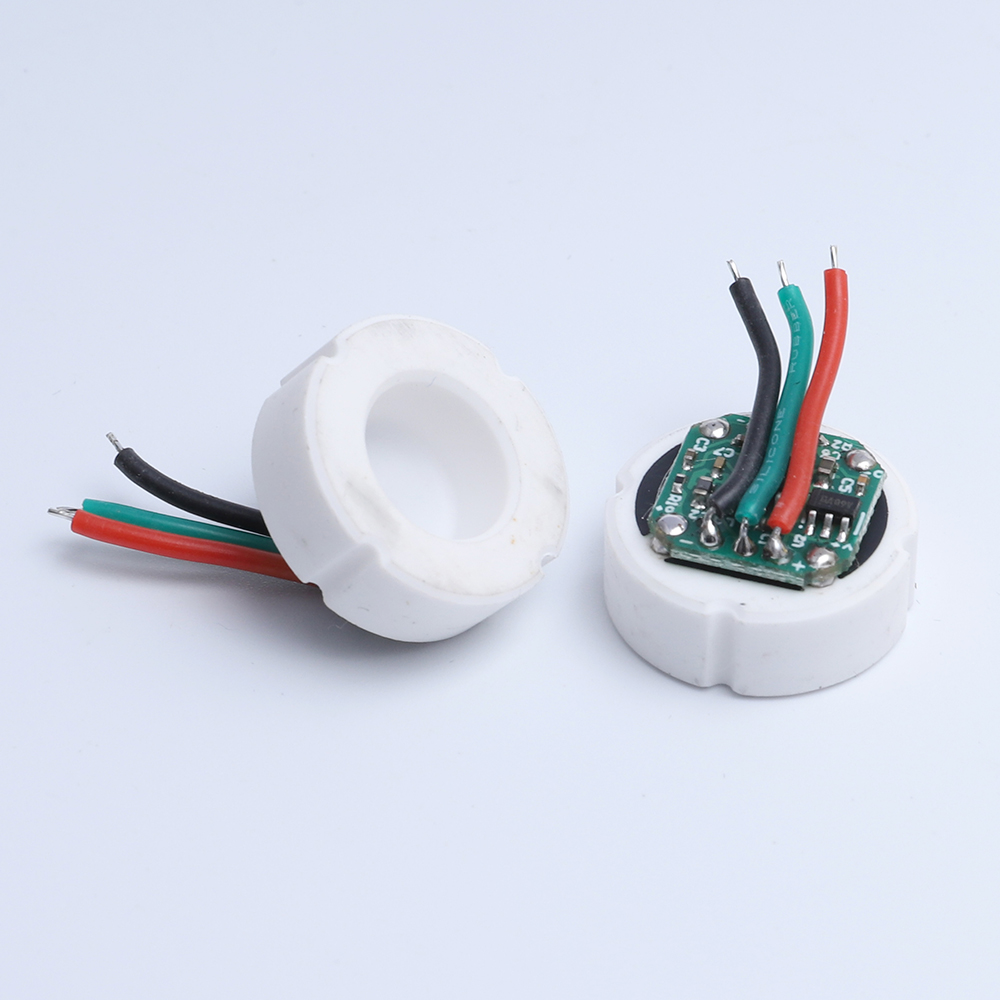 Ceramic pressure sensor modules showing a circuit board and connection wires