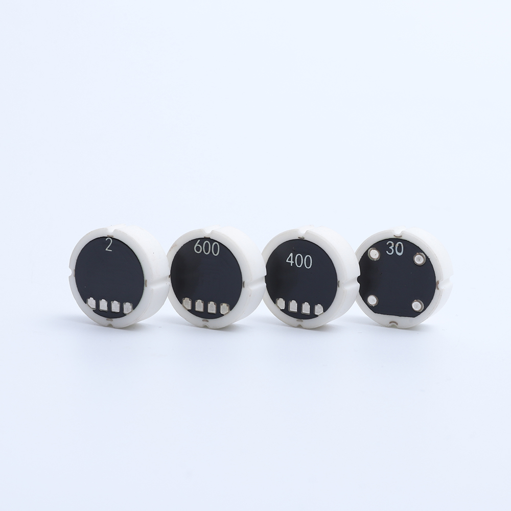 Ceramic pressure sensor cores with electrical contact pads